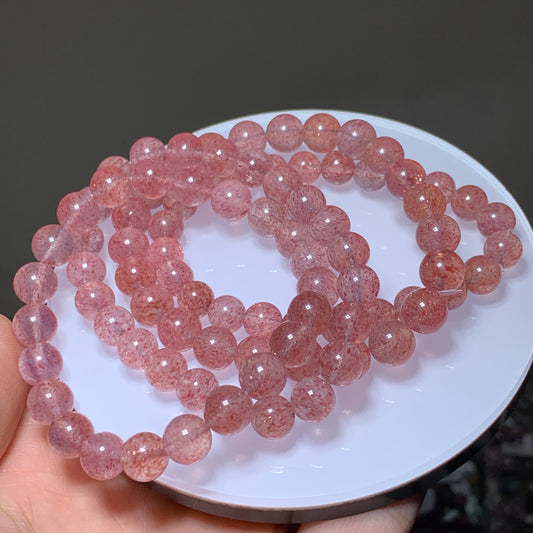 Clear strawberry quartz crystal bracelet