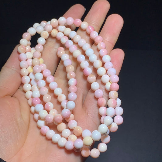 Pink queen shell crystal string